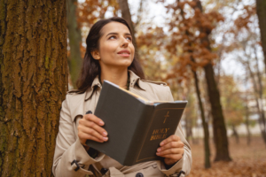 Cheerful female person looking at the sky